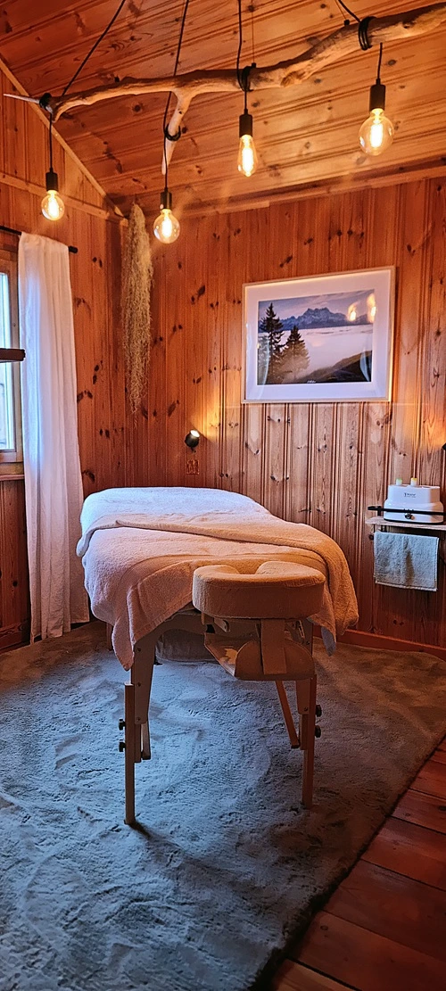 a table massage in a cosy room